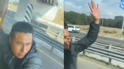 Hombre intenta asaltar tráiler y termina colgado de puerta de conductor